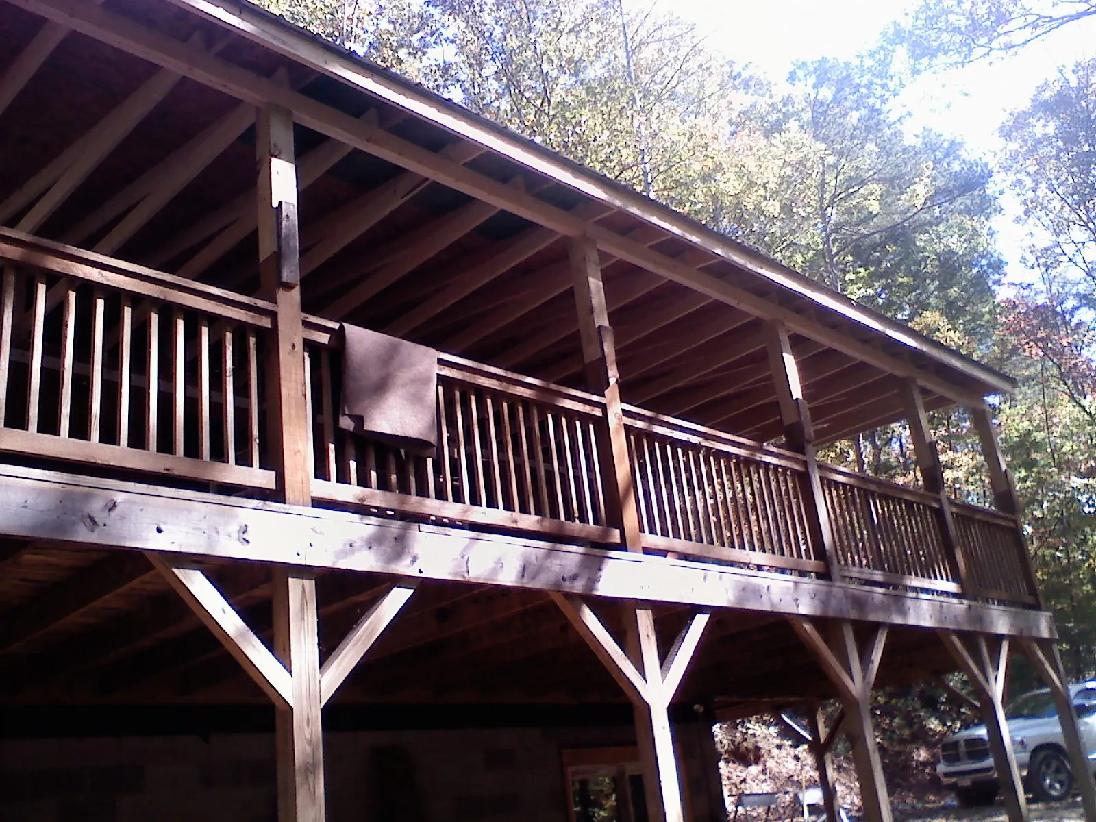 Timber framing under a new elevated porch and deck — Roof Leak Repair in Salamanca by Roofing Brothers
